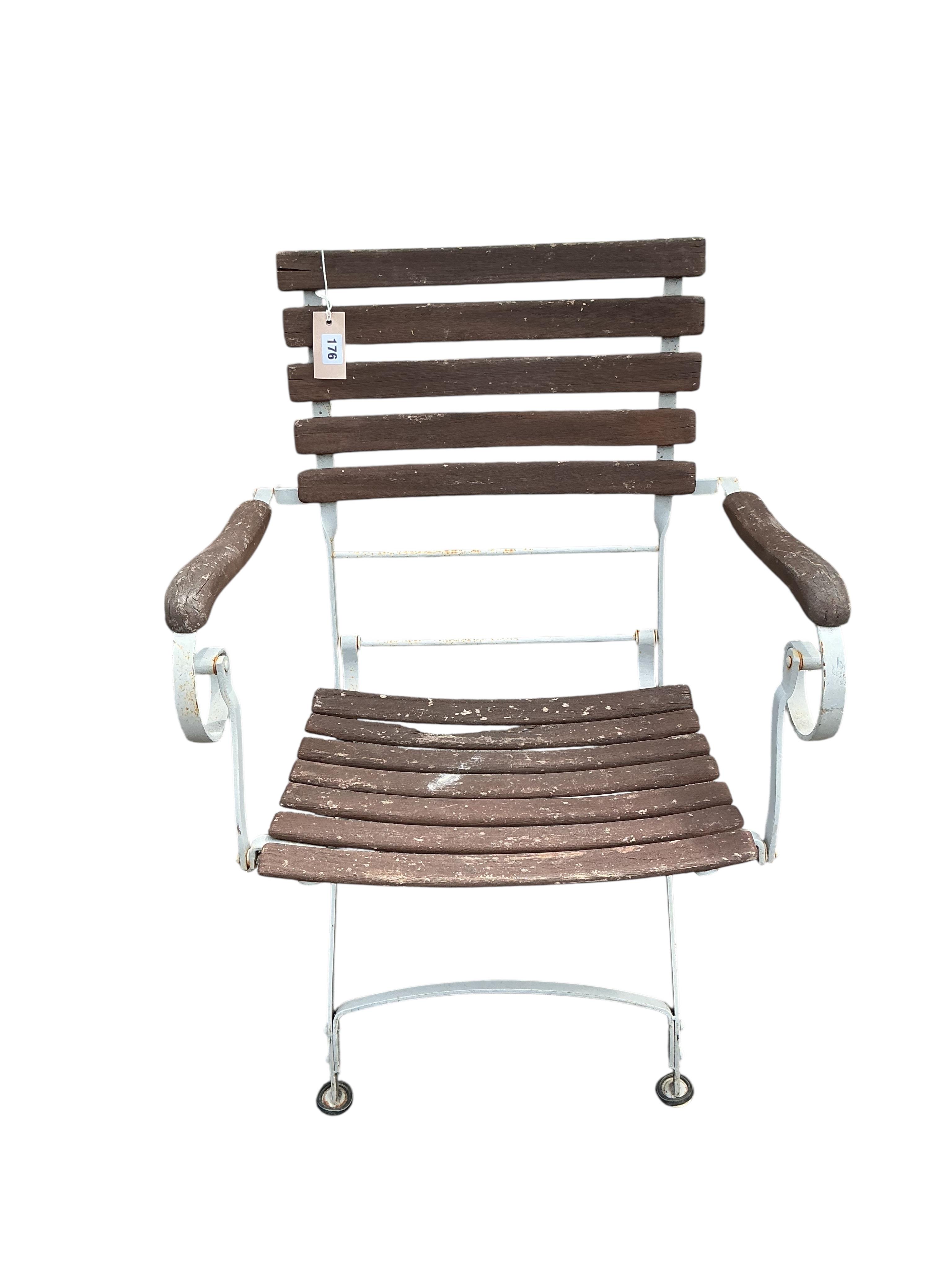 A pair of Kewdos slatted wood wrought iron folding garden elbow chairs